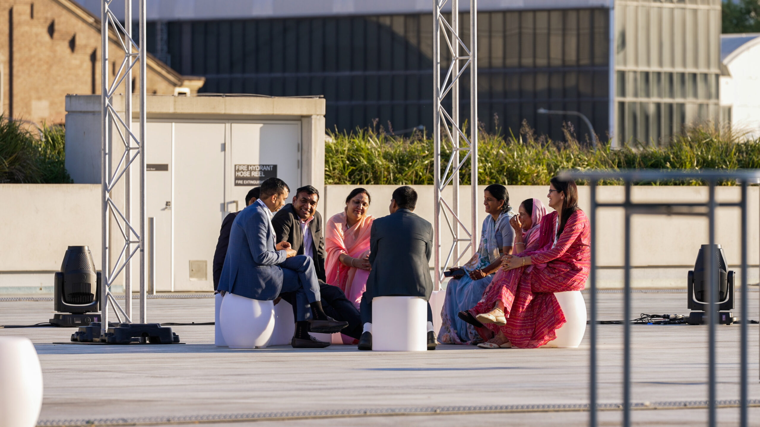 People discussing in a circle on ICC Sydney's event deck