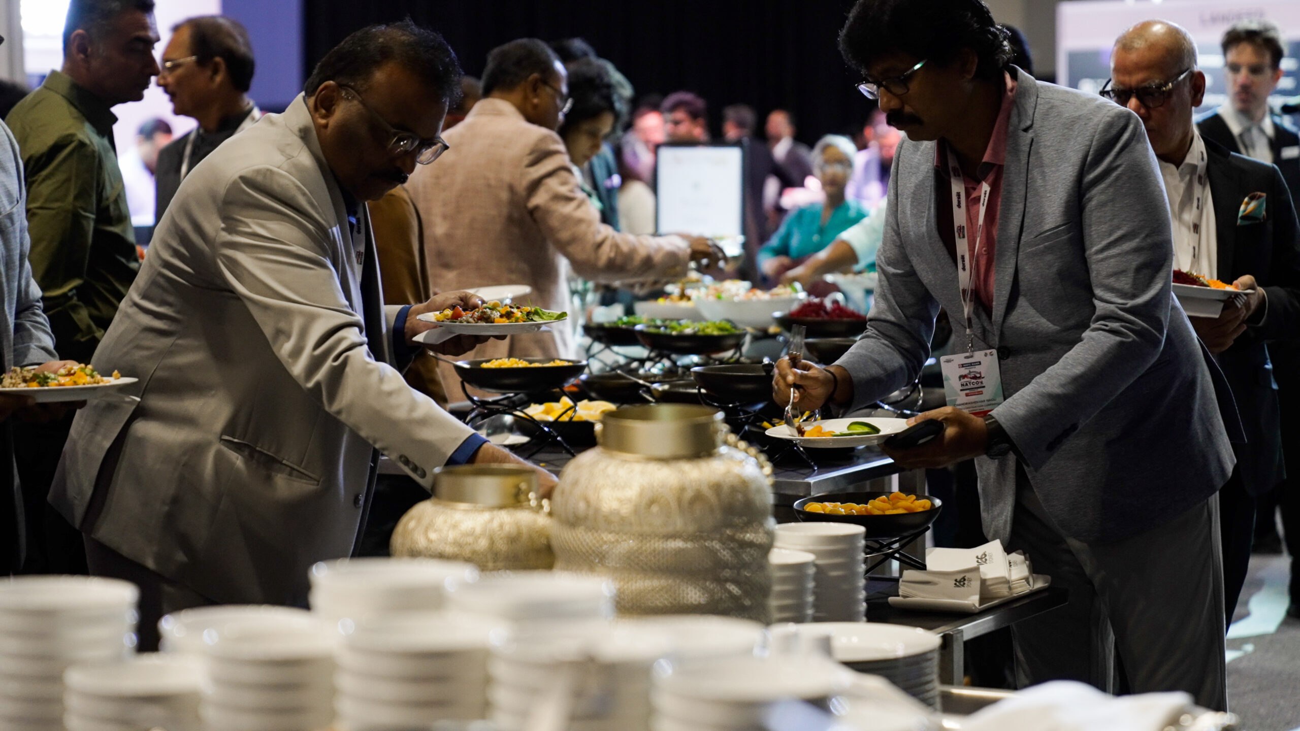 Patrons of CREDAI Natcon collecting food at ICC Sydney's buffet