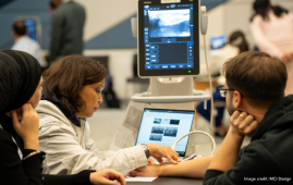 Attendees at ISPRM hooked up to a medical device at ICC Sydney's Exhibition Centre