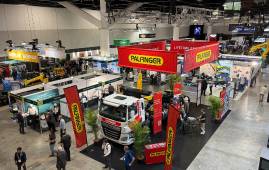 ReGEN Expo at ICC Sydney Exhibition hall. Shot taken from slightly above, featuring a recycling truck in the middle of the floor.