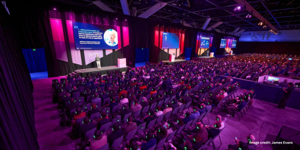 Case Study Images (6) AWS Case study image from Convention centre with purple lights.