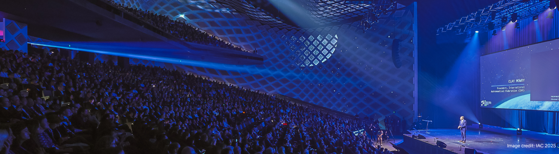 Darling Harbour Theatre alight with IAC 2025 signage and attendees