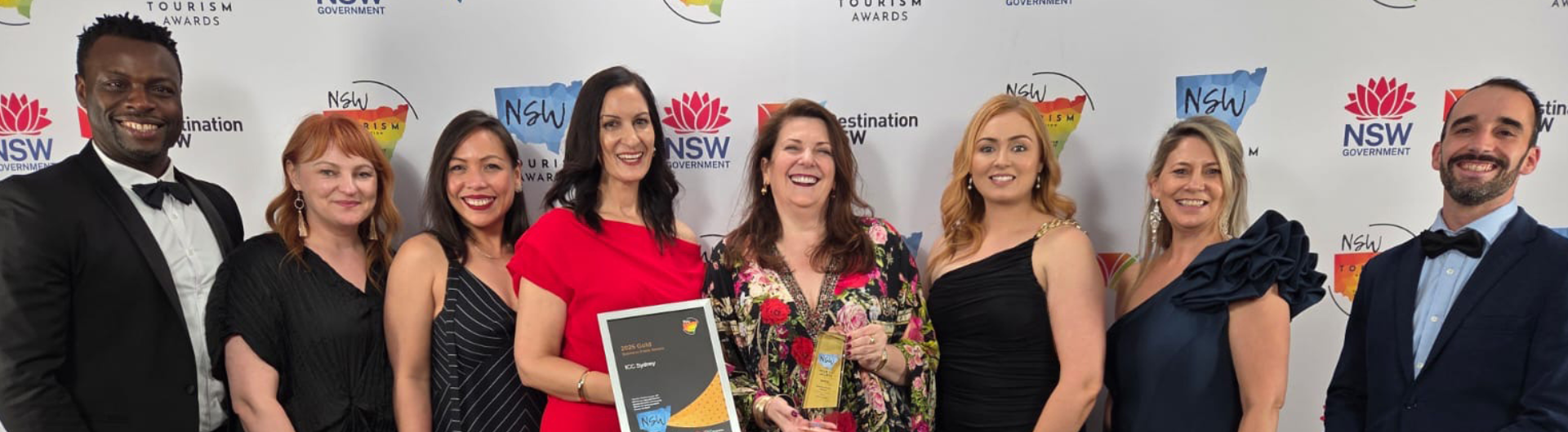 NSW Visitor economy ... ICC Sydney takes home gold. team shot with the team holding the award